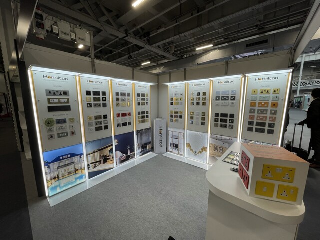 Exhibition stand, illuminated graphics and product displays